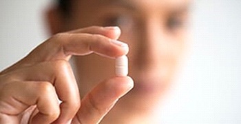 Person holding pill medication in Tallahassee