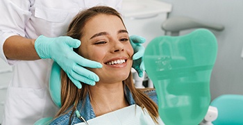 woman smiling after teeth whitening 