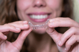 a close-up of an Invisalign aligner